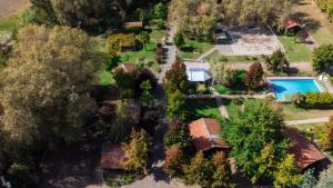 an aerial view of a house with a swimming pool at Cabañas Los Culenes in Colbún