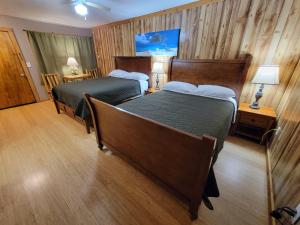 Postel nebo postele na pokoji v ubytování Crescent motel