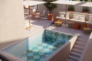 Bazén v ubytování Adiya Signature Hotel - Adults only nebo v jeho okolí