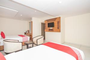 Postel nebo postele na pokoji v ubytování Super Hotel O Ivy Dew Drops