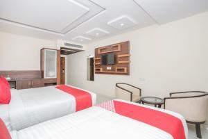Postel nebo postele na pokoji v ubytování Super Hotel O Ivy Dew Drops