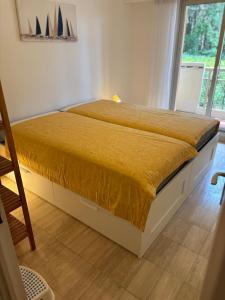 En eller flere senge i et værelse på Le refuge varois