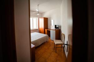 A bed or beds in a room at Residence Stella Maris