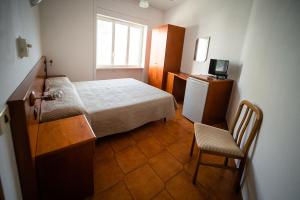 A bed or beds in a room at Residence Stella Maris