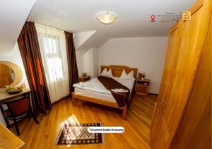 Postel nebo postele na pokoji v ubytování Transylvania Hills