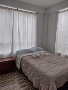 Postel nebo postele na pokoji v ubytování Villa Isabel