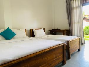Postel nebo postele na pokoji v ubytování Rams Resort