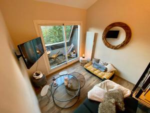 A seating area at Le Duplex - Cosy & Vue Montagnes