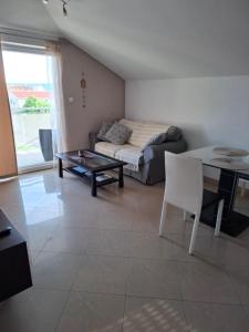 Posezení v ubytování Apartment Tin