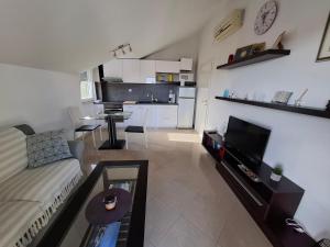Kuchyň nebo kuchyňský kout v ubytování Apartment Tin