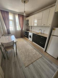 A kitchen or kitchenette at VATAN SUİT
