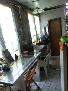 Η κουζίνα ή μικρή κουζίνα στο Cirlene e Lyncon +3 φωτογραφίες