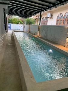 a large pool of water in a building at Casa Syukur in Cukai