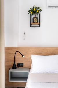 Postel nebo postele na pokoji v ubytování Ethra Apartment