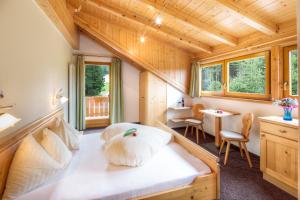 Postel nebo postele na pokoji v ubytování Hotel Wieslhof
