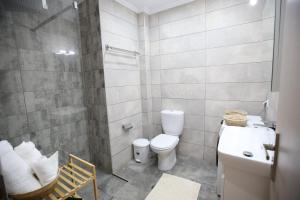 Koupelna v ubytování Bouskos Apartment + 2 fotografie