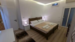 Ένα ή περισσότερα κρεβάτια σε δωμάτιο στο The Parkside Villa Apartment I +8 φωτογραφίες