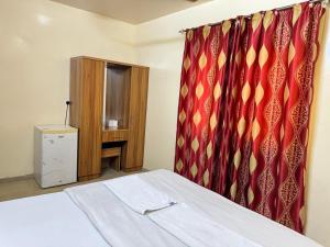 Postel nebo postele na pokoji v ubytování Al Khaima Hotel