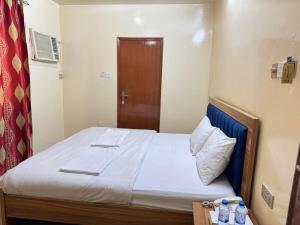 Postel nebo postele na pokoji v ubytování Al Khaima Hotel