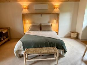 Postel nebo postele na pokoji v ubytování Au Détour des Châteaux