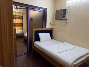 Postel nebo postele na pokoji v ubytování Al Khaima Hotel