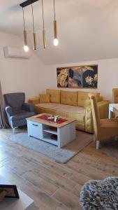 Posezení v ubytování Apartman Tina