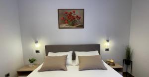 Postel nebo postele na pokoji v ubytování Apartments Anna I