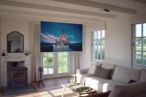 Posezení v ubytování Charmant dijkhuisje aan zee in Cadzand