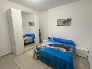 Ένα ή περισσότερα κρεβάτια σε δωμάτιο στο Sweet home. Casa vacanza Ischia.