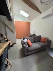 Khu vực ghế ngồi tại Appartement cosy et équipé