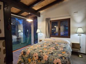 Postel nebo postele na pokoji v ubytování Nuevo Ecolodge Cabañeros
