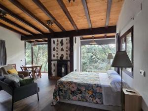 Postel nebo postele na pokoji v ubytování Nuevo Ecolodge Cabañeros