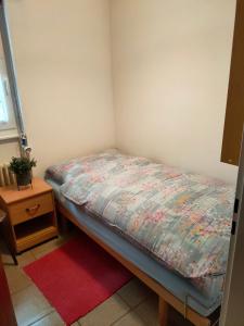 En eller flere senge i et værelse på Pfeiren Leukerbad