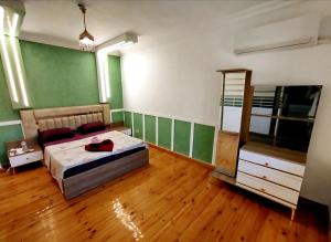 Postel nebo postele na pokoji v ubytování Elysian Residence + 10 fotografií