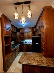 Kuchyň nebo kuchyňský kout v ubytování Elysian Residence