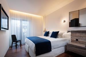 Ένα ή περισσότερα κρεβάτια σε δωμάτιο στο Sea Path IV Chania city center luxury Appartment