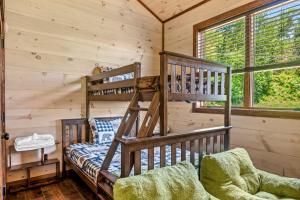 Ένα ή περισσότερα κρεβάτια σε δωμάτιο στο Kodiak Chalet