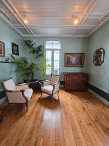 Posezení v ubytování Maison d'Hôtes L'Intemporelle