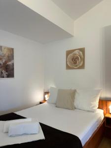 Voodi või voodid majutusasutuse Apartmani Samec toas