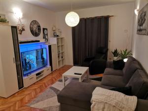 Ein Sitzbereich in der Unterkunft Apartment Sanja