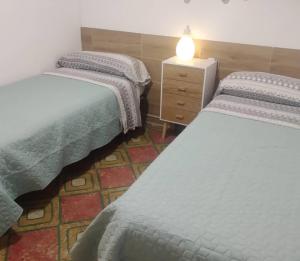 Ein Bett oder Betten in einem Zimmer der Unterkunft Casa Ani