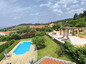 an aerial view of a villa with a swimming pool at Quinta do Retiro in Felgar