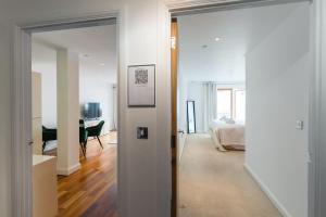 a living room with a door leading to a bedroom at In the middle of Cardiff City centre in Cardiff
