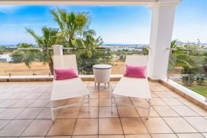 A balcony or terrace at Villa Views Can Funtasa II