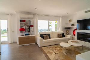 A seating area at Villa Views Can Funtasa II