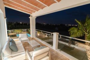 A balcony or terrace at Villa Views Can Funtasa II