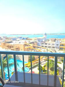a view of the water from the balcony of a resort at porto marina 3 in El Alamein
