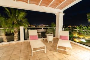 A balcony or terrace at Villa Views Can Funtasa II