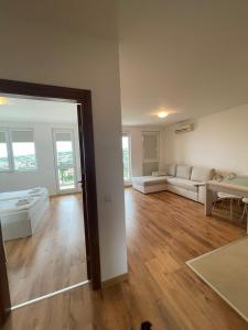 Ένα ή περισσότερα κρεβάτια σε δωμάτιο στο Fortuna Cape 4 apartment +8 φωτογραφίες