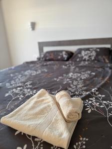 Postel nebo postele na pokoji v ubytování Guest House Nakjoski